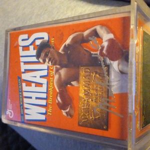 Muhammad Ali wheatie box in a plastic case